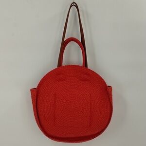 Woven red circular shoulder bag purse magnetic closure unbranded